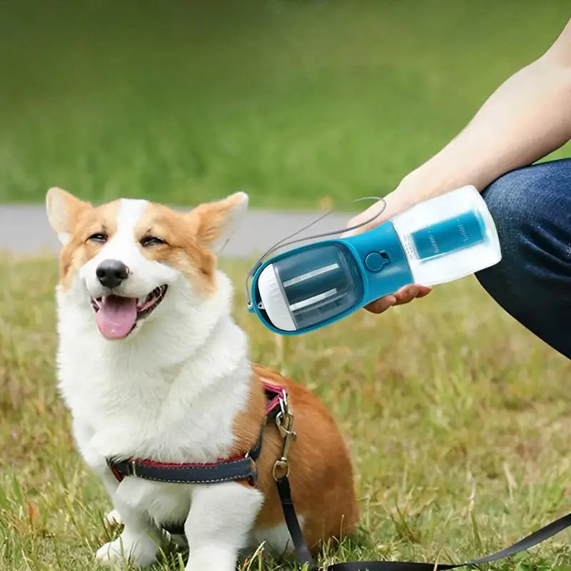 3-in-1 Pet Water Bottle – Feeder, Dispenser & Waste Bag Holder